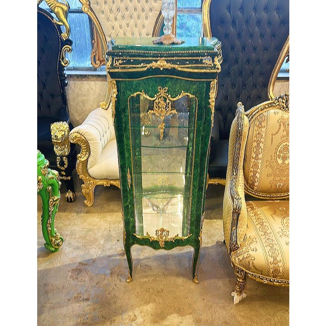 In love with the details. Stunning Green French vitrine. Has been refinished in Italy. Has a beautiful gold details in the...