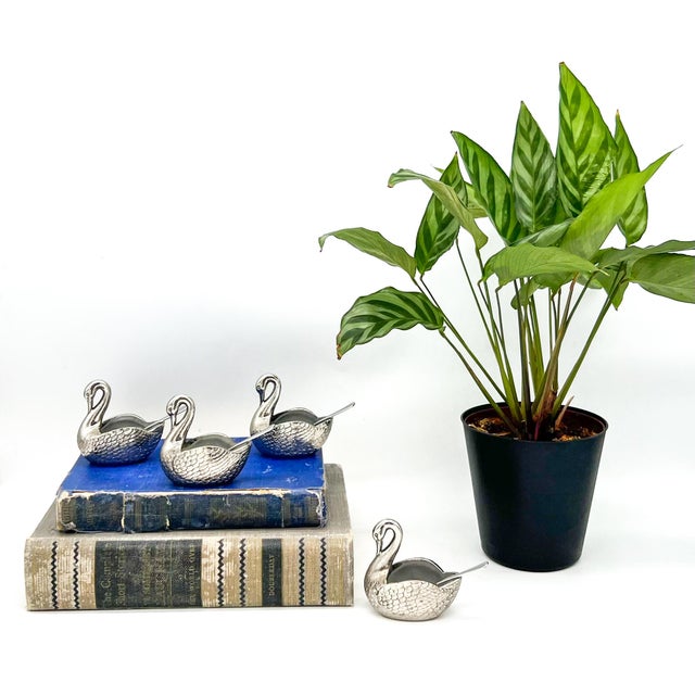 Charming set of four vintage silver-plated swan salt cellars, each beautifully detailed with textured feathers and...