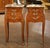 Elegant in scale and beautifully detailed, this pair of vintage French bedside tables combines graceful Louis XV styling...
