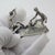 Suspended in high tension and sporting drama, this vintage silver narrative scene captures the exact moment of a penalty...
