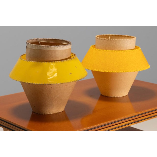 This pair of table lamps was produced in Czechoslovakia during the 1970s–1980s and reflects the decorative lighting design...