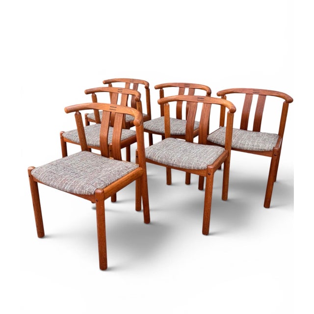 A superb set of six authentic Danish mid-century dining chairs designed by Hans (H.) Frydendal and manufactured by...