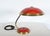 This is a great example of the much sought after 1950s modernist german helo leuchten lamp. The lamp has a curved brass...