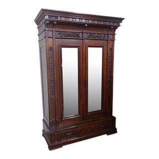 Late 19th Century Victorian Walnut Renaissance Revival Wardrobe For Sale