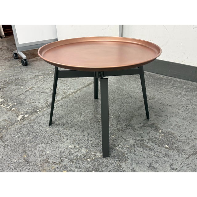Design Plus Gallery presents a Husk Side Table by Patricia Urquiola in 2013 for B & B Italia. A circular metal copper...