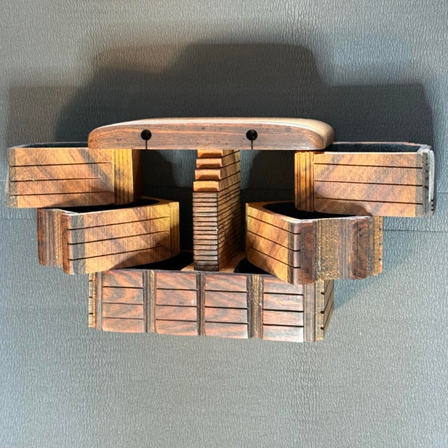 1988 signed sculpture box by Po Shun Leong (b. 1941). The artist is known since the late for his highly intricate one-of-...