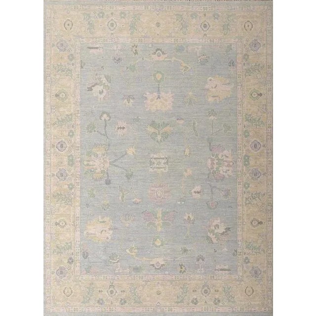 Light Blue, Sage Green with pops of Lavender modern handknotted oushak rug As all of our rugs are made by hand, each may...