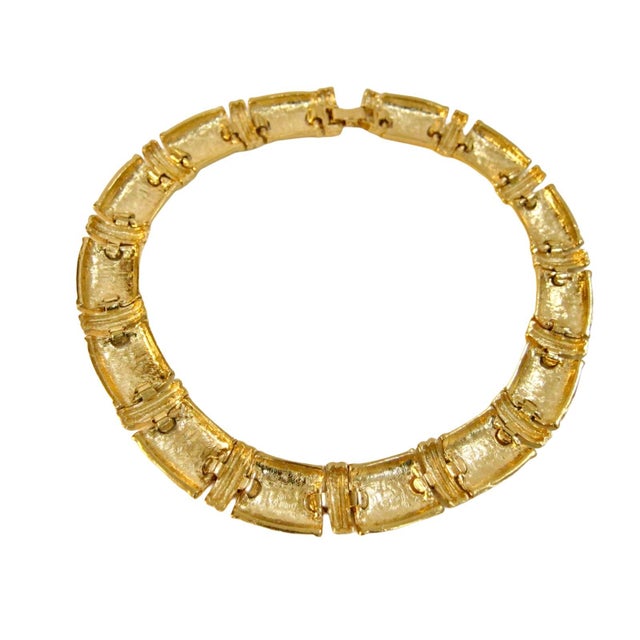 1980s highly polished gold-plated carved link panel fold over clasp necklace Attributed to "Givenchy" Unsigned Frm my...