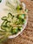 This is a charming Italian ceramic platter featuring a raised, hand-painted fig motif. The design wraps asymmetrically...