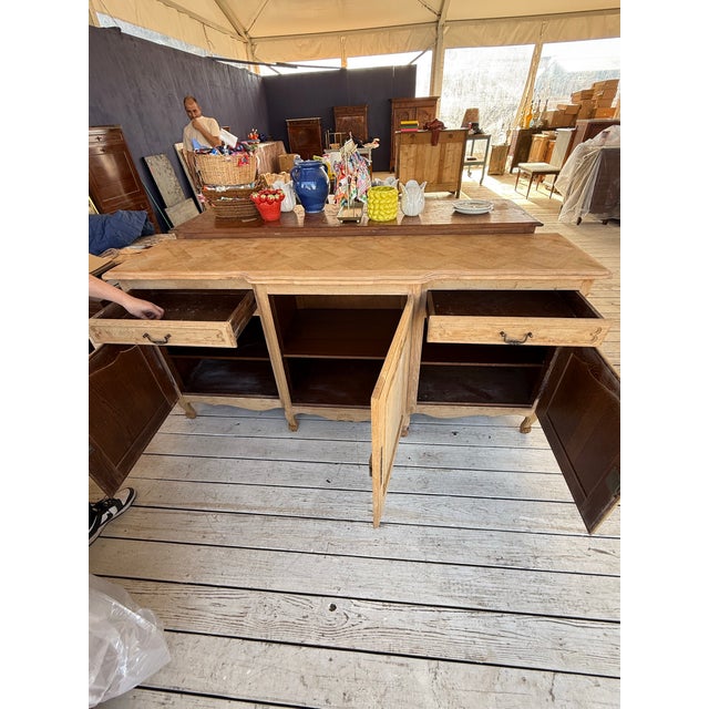 French louis XV sideboard made of solid walnut the wood was professionally sanded and bleached. The sideboard has two...