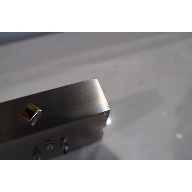 Beautiful steel clock in art deco style, with alarm clock, Quartz This piece has an attribution mark, I am sure that it is...