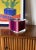 Postmodern pink acrylic glass and brass Ice Bucket Italy, 1980s H 19 × 18 × 18 cm Conditions: very good consistent with...