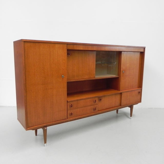Long Vintage Highboard, 1960s, in Good conditions. Designed 1960 to 1969