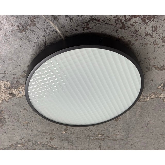 Design Plus Gallery presents the 2085 Felix Flush Mount by Charles De Lisle for Phoenix Day. The light fixture is...