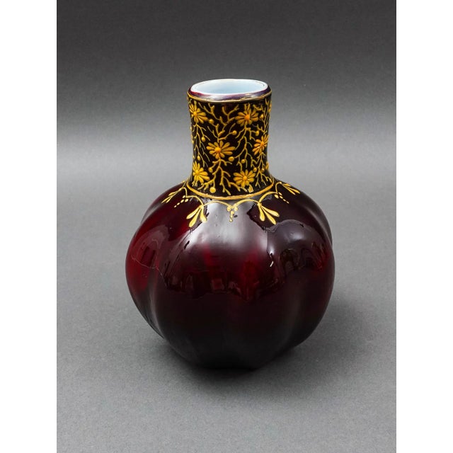 Bohemian Ox Blood Red Floral Gilded Cased Art Glass Vase. Measures approximately 4 7/8" diameter, 6 1/4" high.