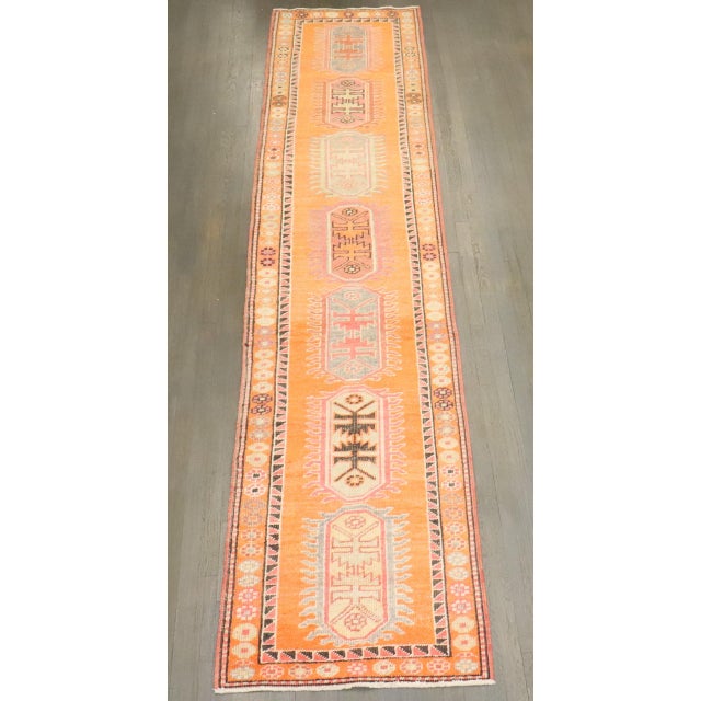 A mid 20th century orange color geometric Turkish Anatolian Runner