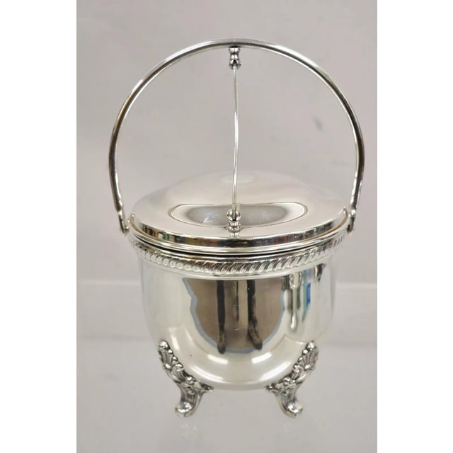 Vintage Victorian Style Reticulated Handle Silver Plated Ice Bucket by Bristol. Circa Mid 20th Century. Measurements:...