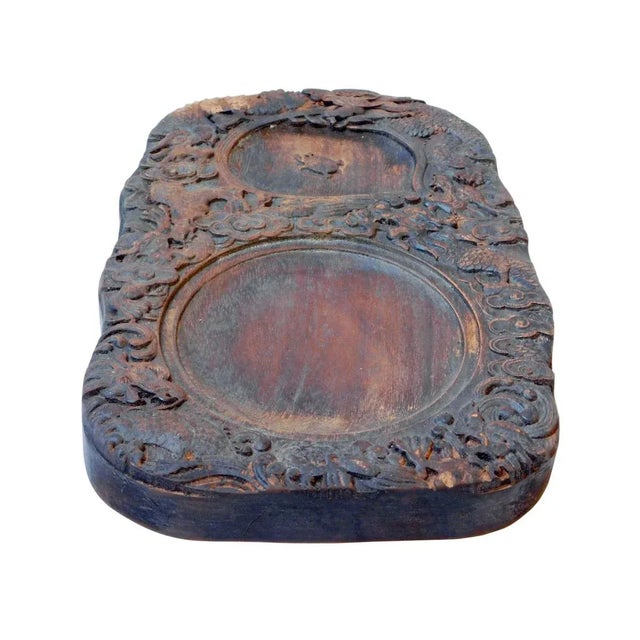 This Chinese calligraphic ink pad is made of solid wood with hand craved dragon. Unique with character. this is a good...