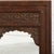 The crisply carved arch and frame was originally a Rajasthani window and would have held small shutters inside. In a rich...