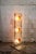 Three-light floor lamp with a chromed metal frame and corrugated Murano glass plates. Designer: Mauro Marzollo...