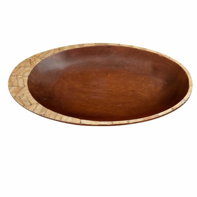 Vintage mid century oblong wood and capiz shell catchall bowl. Measures 16” w x 9”d x 2” h