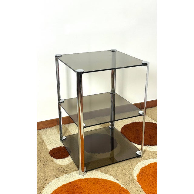 Chromed steel and smoked glass cabinet by Antonio Ari Colombo for Arflex, 1968. Made in Italy. The supporting frame is...
