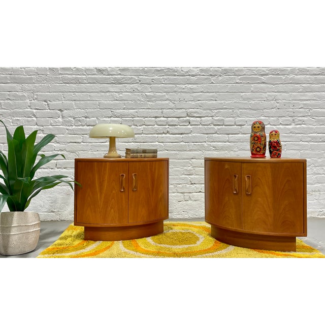 Pair of original G-Plan Fresco corner cabinets, showcasing the clean lines, warm teak tones, and thoughtful craftsmanship...