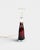 Elegant table lamp by the renowned Swedish glass manufacturer Orrefors, crafted from thick art glass using a red cased-...