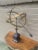 A beautifully crafted iron and brass armillary sphere, evoking the timeless elegance of classical European gardens. Pieces...