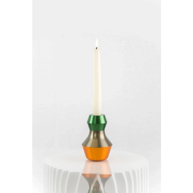 This candleholder is made of solid aluminum constructed with the Mykonos modules: the design and its infinite color...