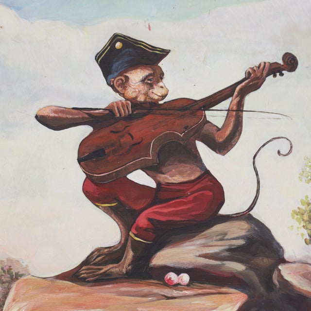A whimsical and rare vintage hand-painted painting on a solid iron panel, featuring a monkey dressed in a military-style...