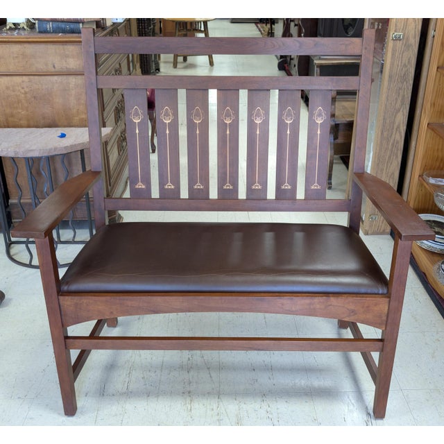 A refined and highly desirable example of American Arts & Crafts design, this Stickley Harvey Ellis settee embodies the...