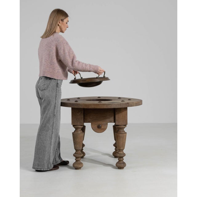 This piece carries genuine presence, its natural bleached oak, arched apron, turned legs immediately setting the tone for...