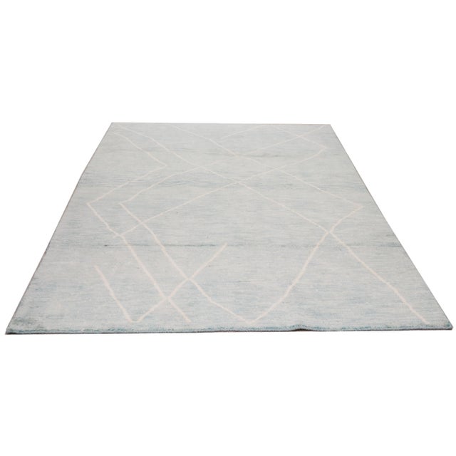 Moroccan Beni Ourain hand knotted rug with natural colors, contemporary style and soft texture.