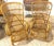 Pair of Italian Mid-Century Rattan High-Back Lounge Chairs in the Style of Franco Albini Italy, circa 1950s An elegant and...