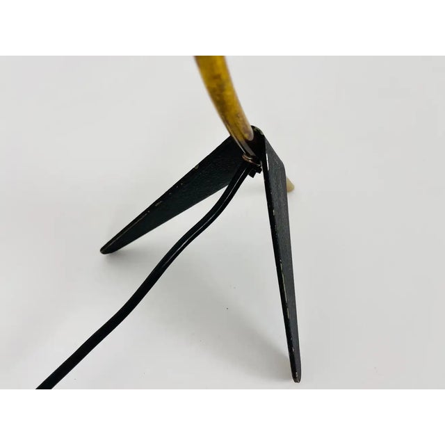 Exceptional mid-century table lamp designed by Louis Kalff for Cosack in the 1950s. Its foot is typical for the designer....