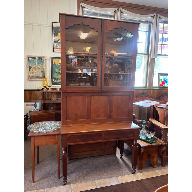 An equisite Early American Plantation, clerk or mail Desk, Circa mid 19th C.. This exceptional 2 piece desk features a...