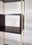 Bookcase by Jules Wabbes for Mobilier Universel, Brass and Wood, Belgium, 1960s This piece is attributed to the mentioned...