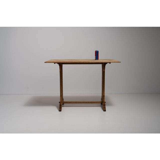 A masterful expression of the Neo-Gothic revival, this French side table from circa 1900 captures the medieval romanticism...