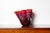 A striking Red Macchia Vase by acclaimed glass artist Dale Chihuly, produced by Portland Press in 2001 and later exhibited...