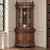 A 19th century French Henri II neoclassical corner vitrine, crafted in oak with a fully rounded facade that forms a...