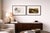 A curated pair of vintage Wyeth study plates, presented in oversized 20” x 30” black gallery frames with architectural...