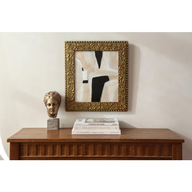 Original abstract painting in a beautiful antique gold frame. This organic piece has a neutral palette of beiges, tan,...
