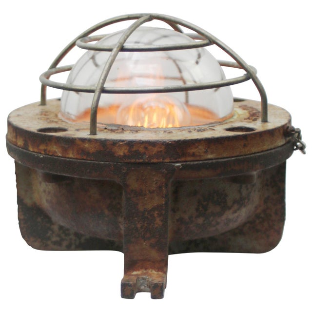 French industrial scone, cast iron wall light by ch. & g. Grimmeisen, paris, france rust brown cast iron with clear...