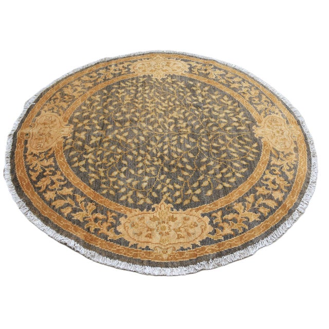 Offered is a spectacular, boutique-quality transitional round rug from the exclusive Ariana Traditional Transitional...