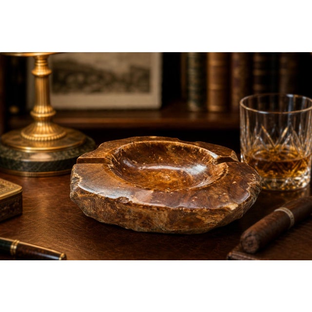 A stunning vintage ashtray crafted entirely from natural onyx, an iconic piece of 1960s Italian design. This piece stands...