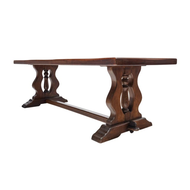 French dining table made of walnut from a monastery in the Rhone Valley, north of Lyon, France. This beautiful table has a...