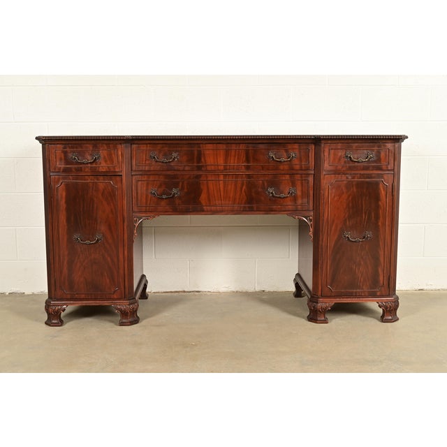 A beautiful Chippendale or Georgian style sideboard buffet or credenza In the manner of Baker Furniture By Northern...