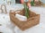 Keeping organized creates structure and allows you to work more efficiently. Our Scallop Collection rattan shelf and...
