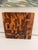 Substantial Mountain Woods end-grain acacia butcher block cutting board featuring a richly varied mosaic of natural wood...